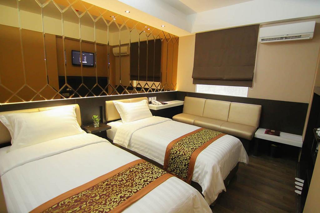 Favor Hotel Makassar City Center By Life Macáçar Quarto foto